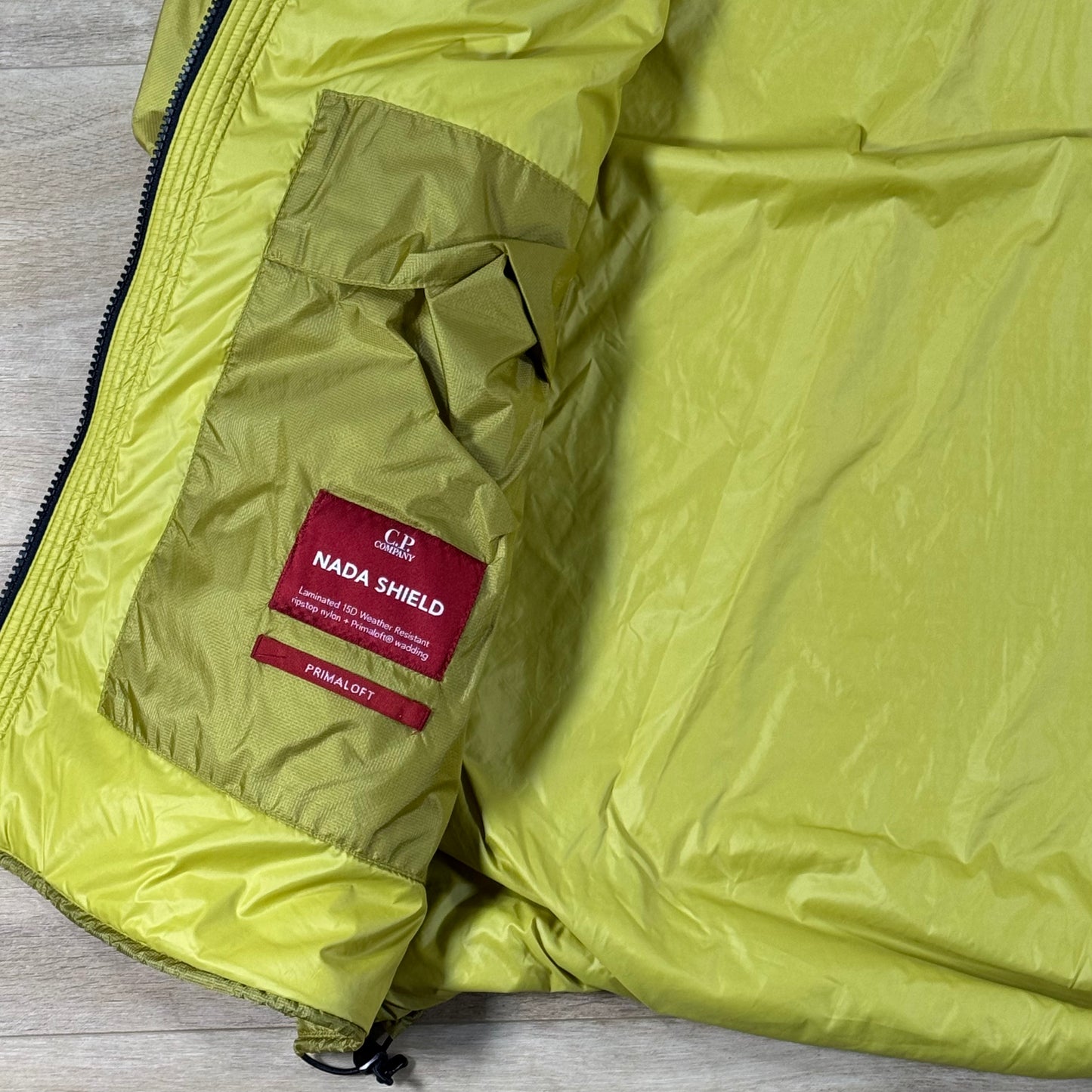 C.P. Company Nada Shield Packable Primaloft Evolve Lens Jacket in Antique Moss - Yellow