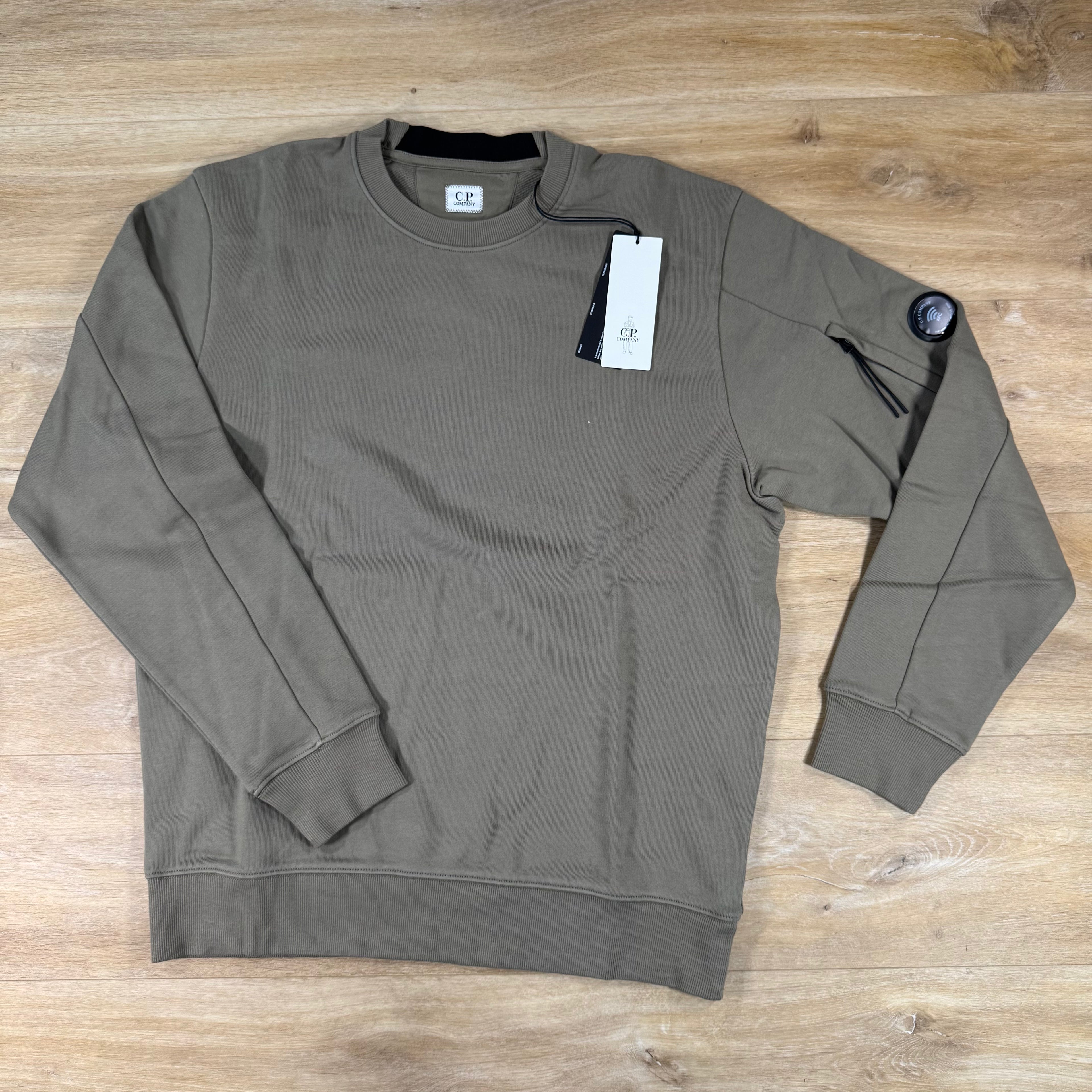 C.P. Company Diagonal Raised Fleece Crewneck Lens Sweatshirt in Fallen Rock - Beige