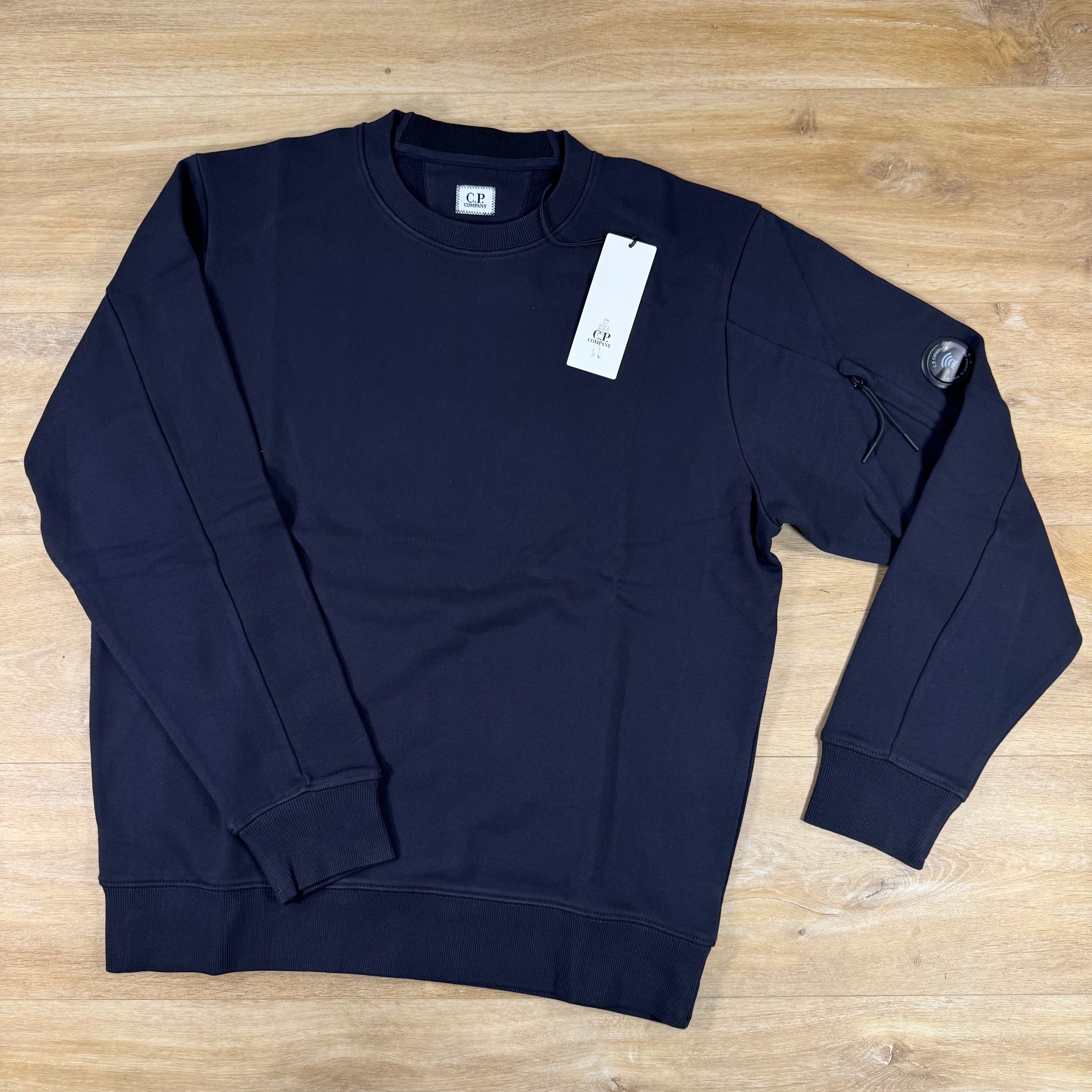 C.P. Company Diagonal Raised Fleece Crewneck Lens Sweatshirt in Navy