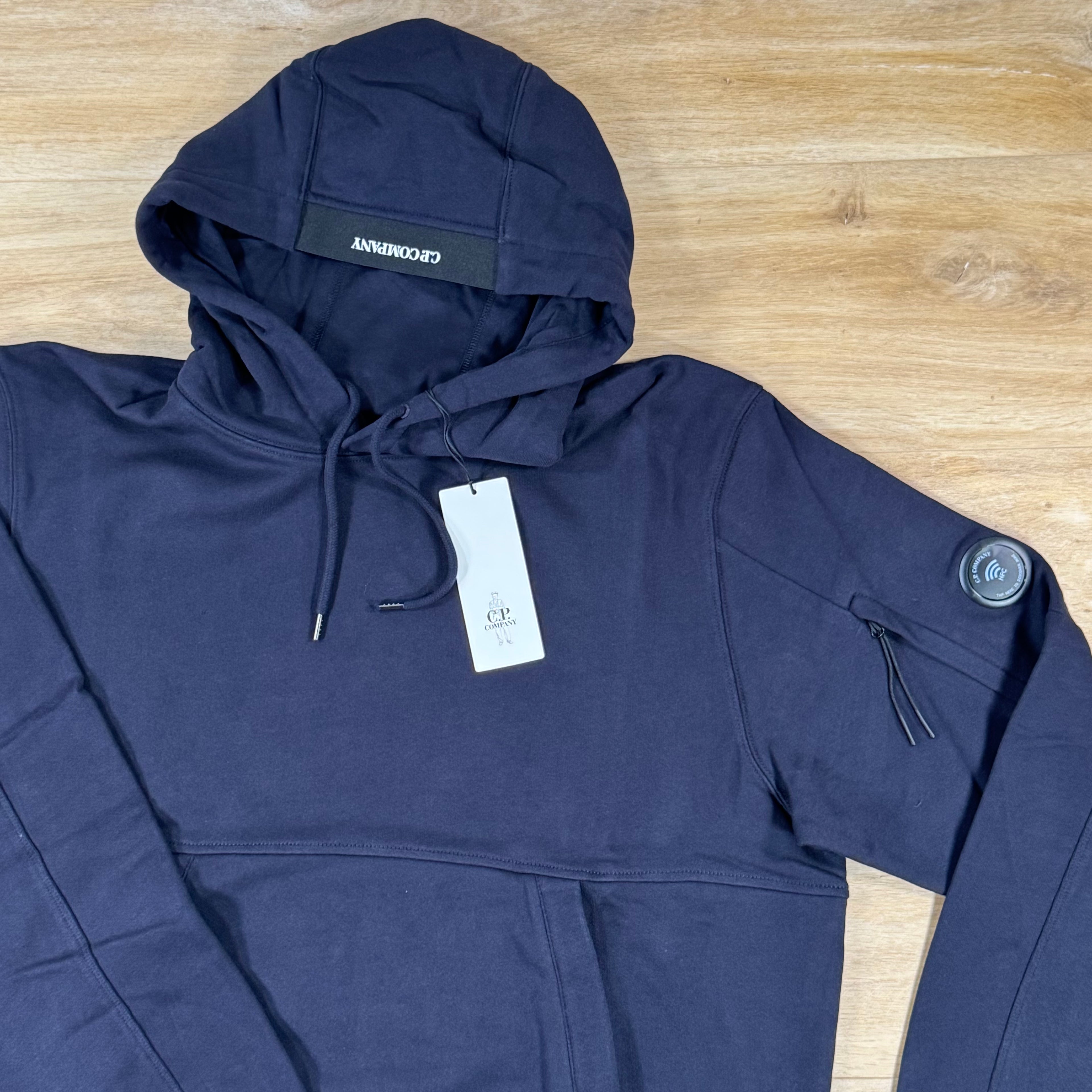 C.P. Company Diagonal Raised Fleece Lens Hoodie in Navy