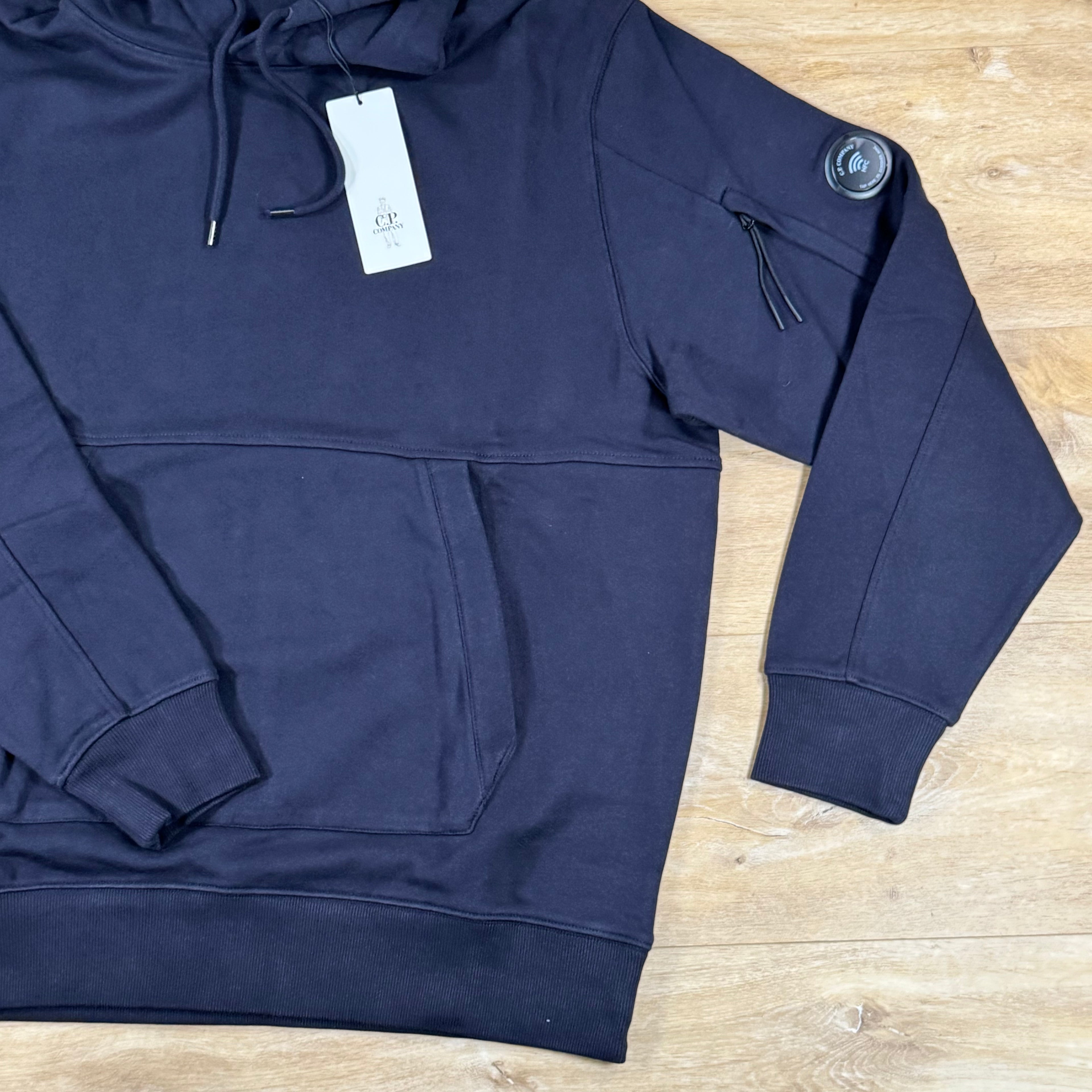 C.P. Company Diagonal Raised Fleece Lens Hoodie in Navy