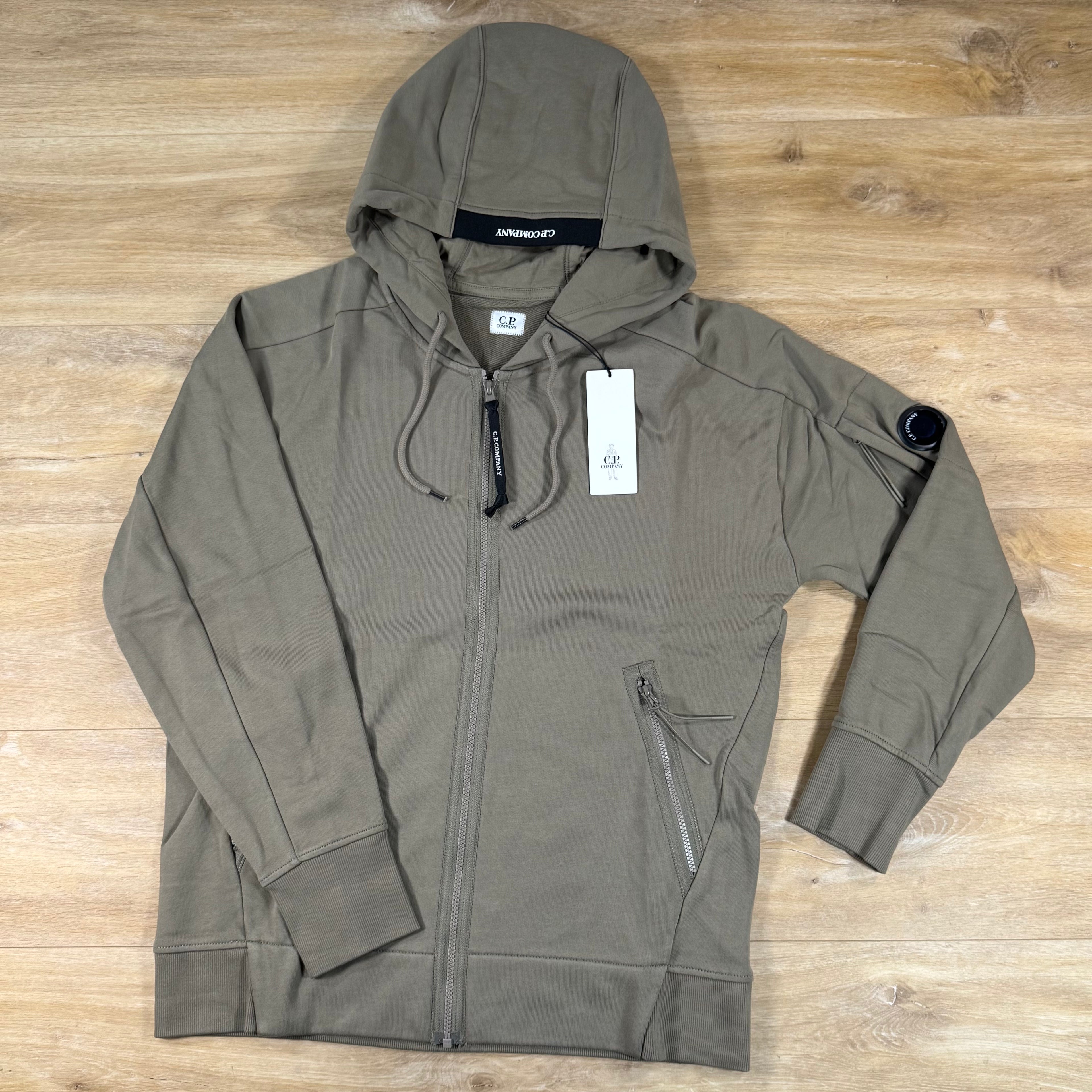 C.P. Company Diagonal Raised Zipped Lens Hoodie in Fallen Rock - Beige