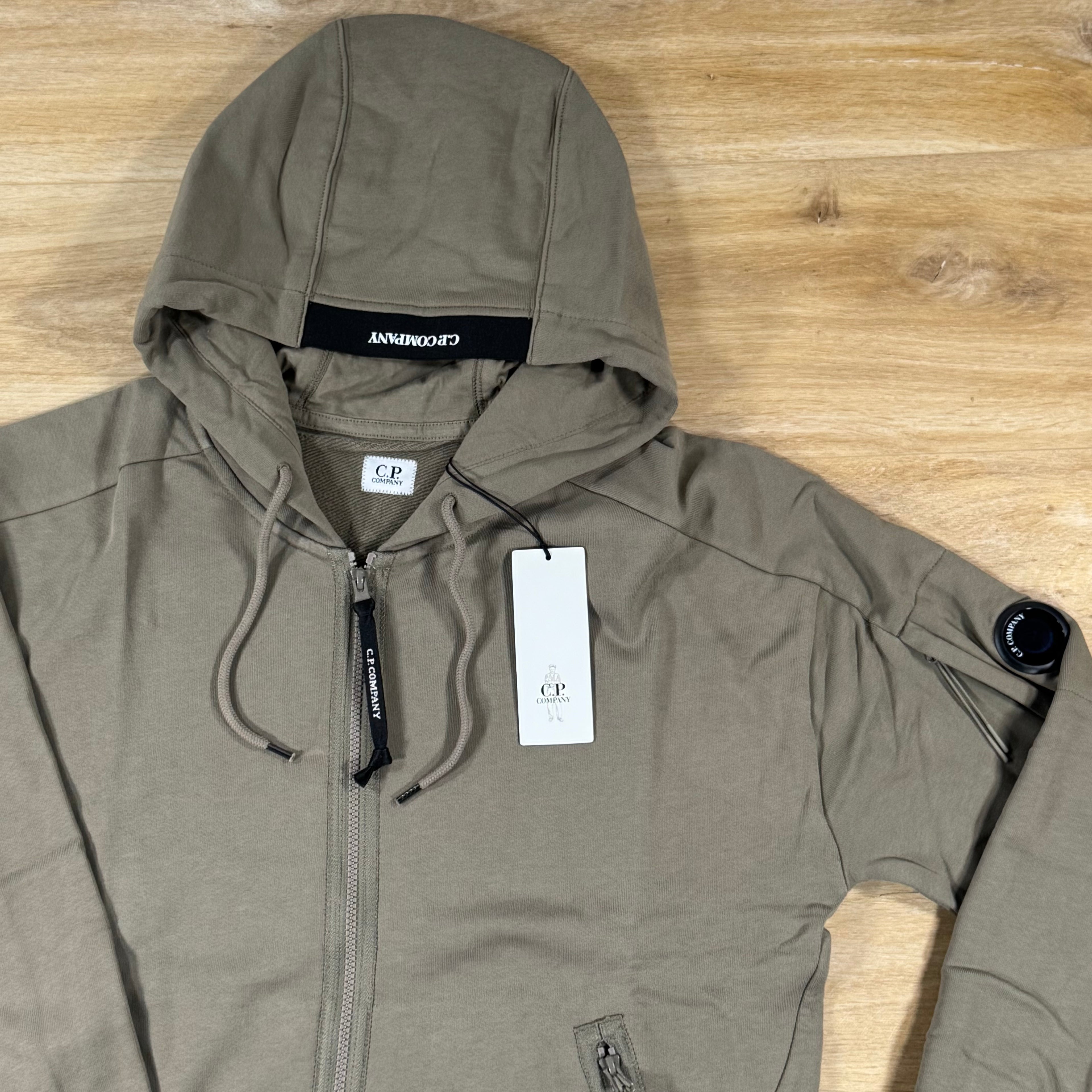 C.P. Company Diagonal Raised Zipped Lens Hoodie in Fallen Rock - Beige
