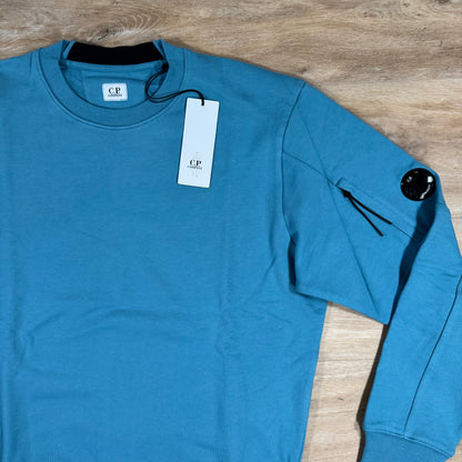 C.P. Company Diagonal Raised Fleece Crewneck Lens Sweatshirt in Aegean Blue