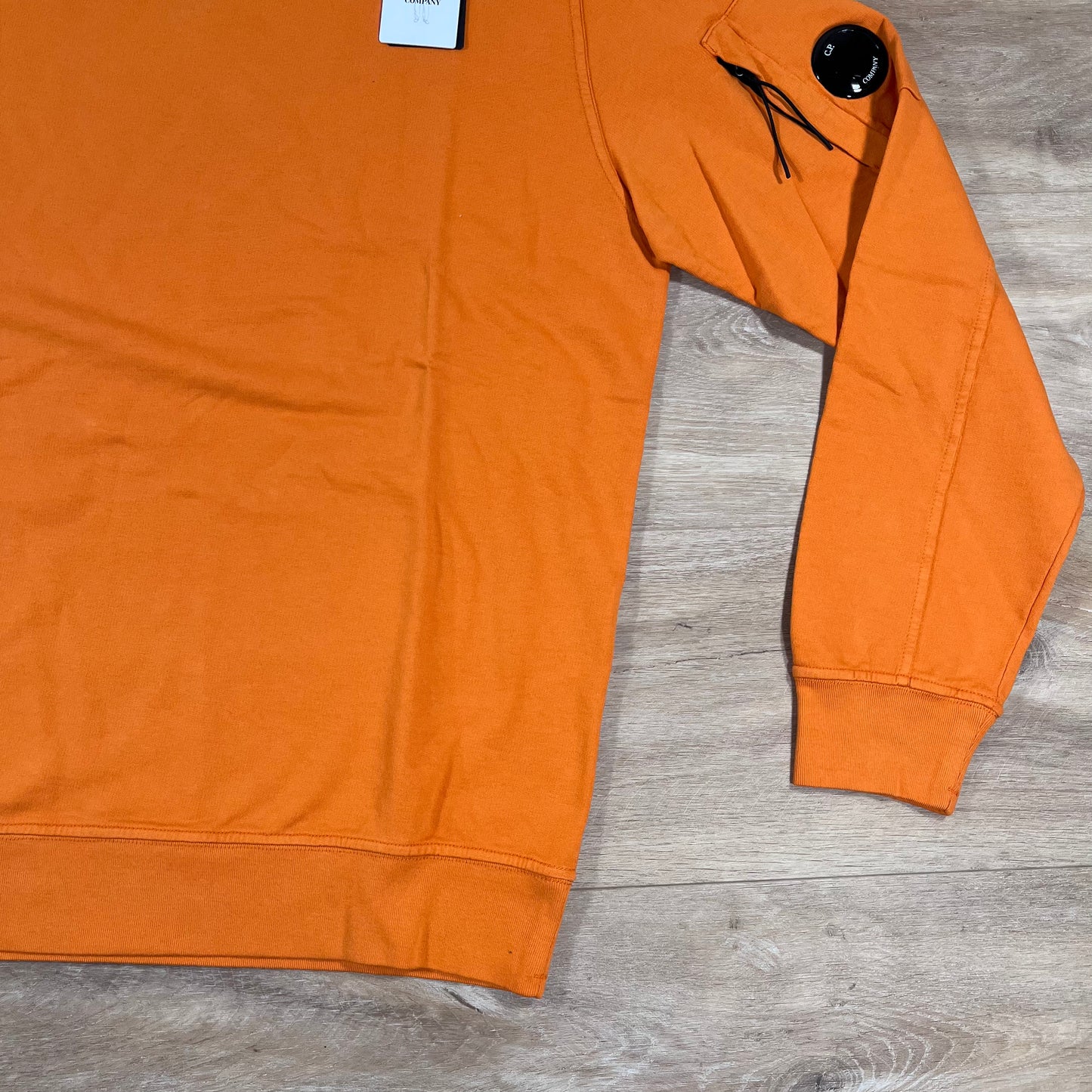 C.P. Company Light Fleece Crewneck Lens Sweatshirt in Russet Orange