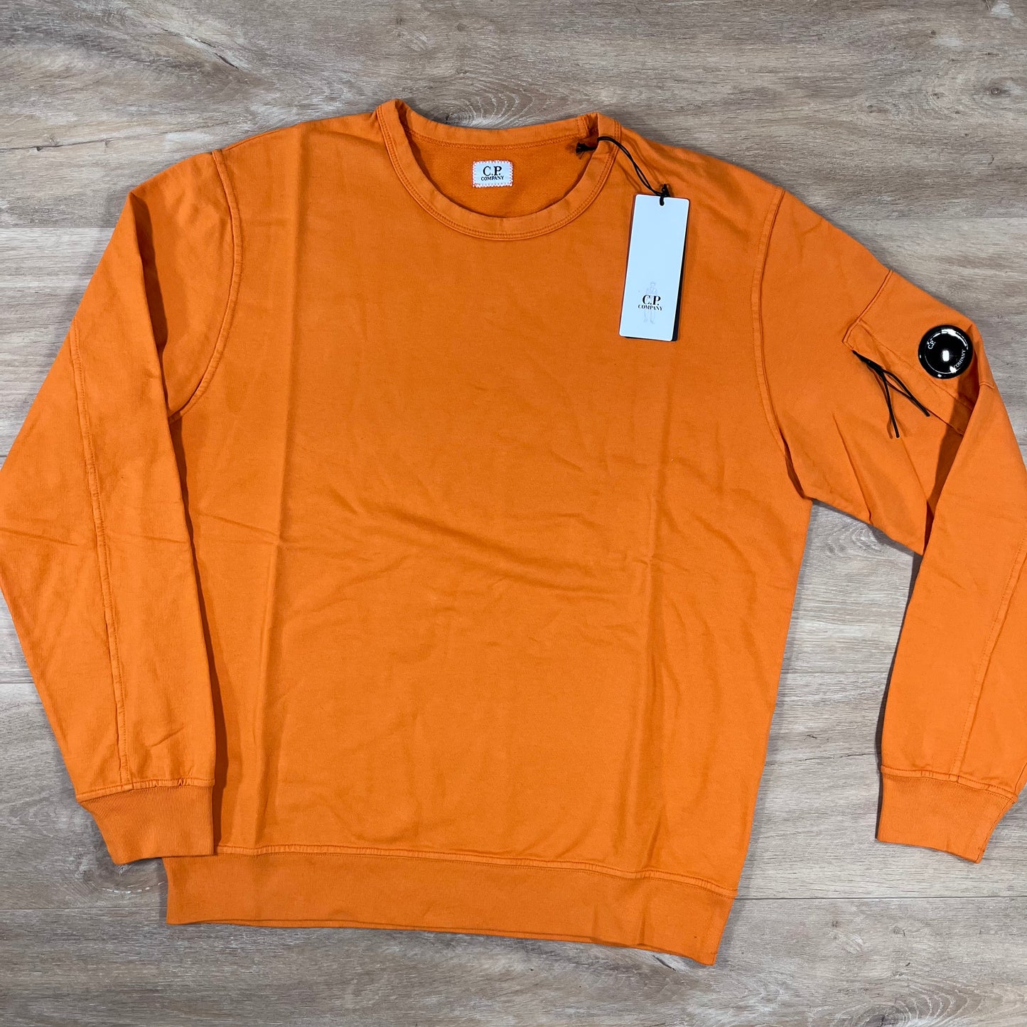 C.P. Company Light Fleece Crewneck Lens Sweatshirt in Russet Orange
