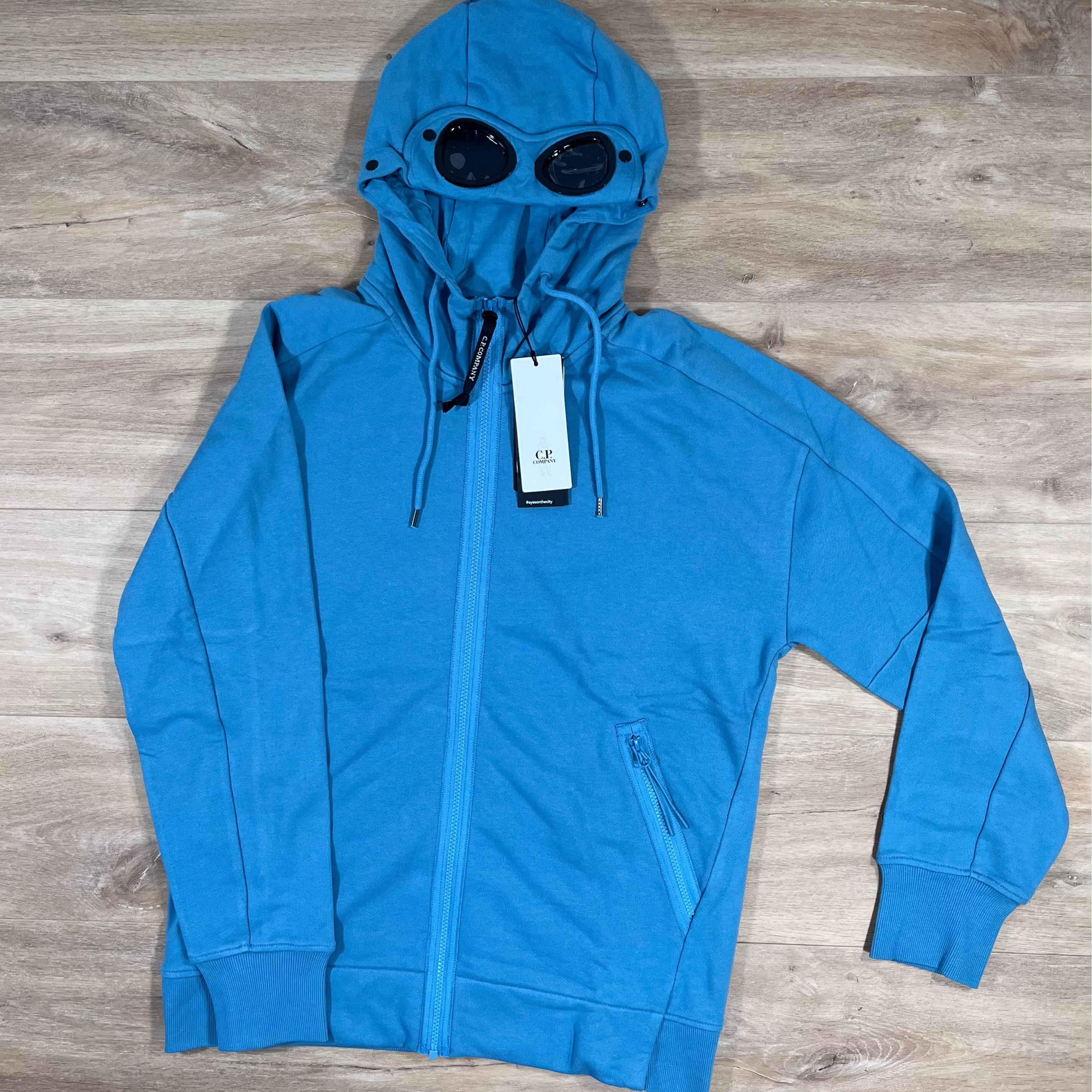 C.P. Company Diagonal Raised Fleece Goggle Hoodie in Aegean Blue – Label Menswear