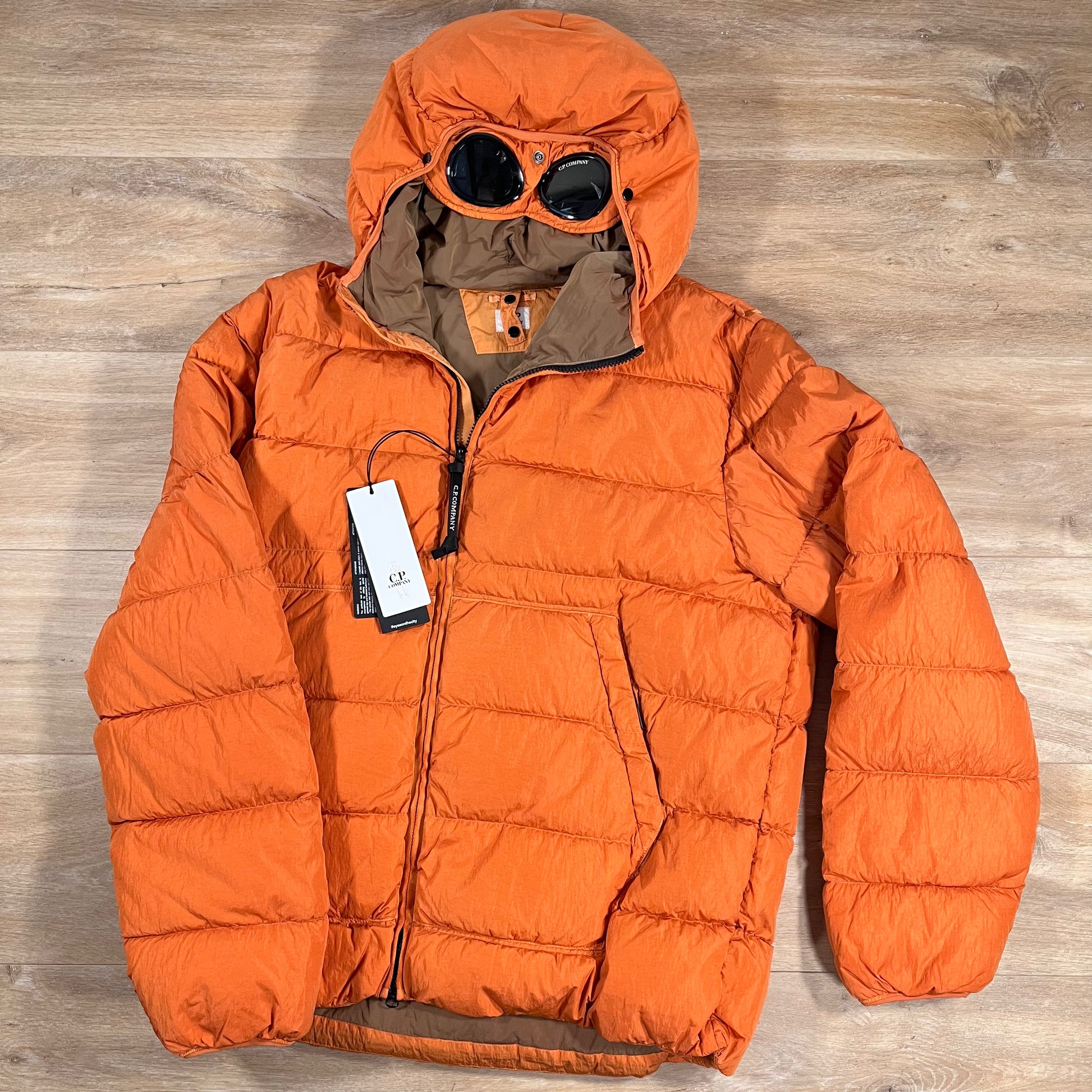C.P. Company Chrome-R Goggle Down Jacket in Russet Orange – Label
