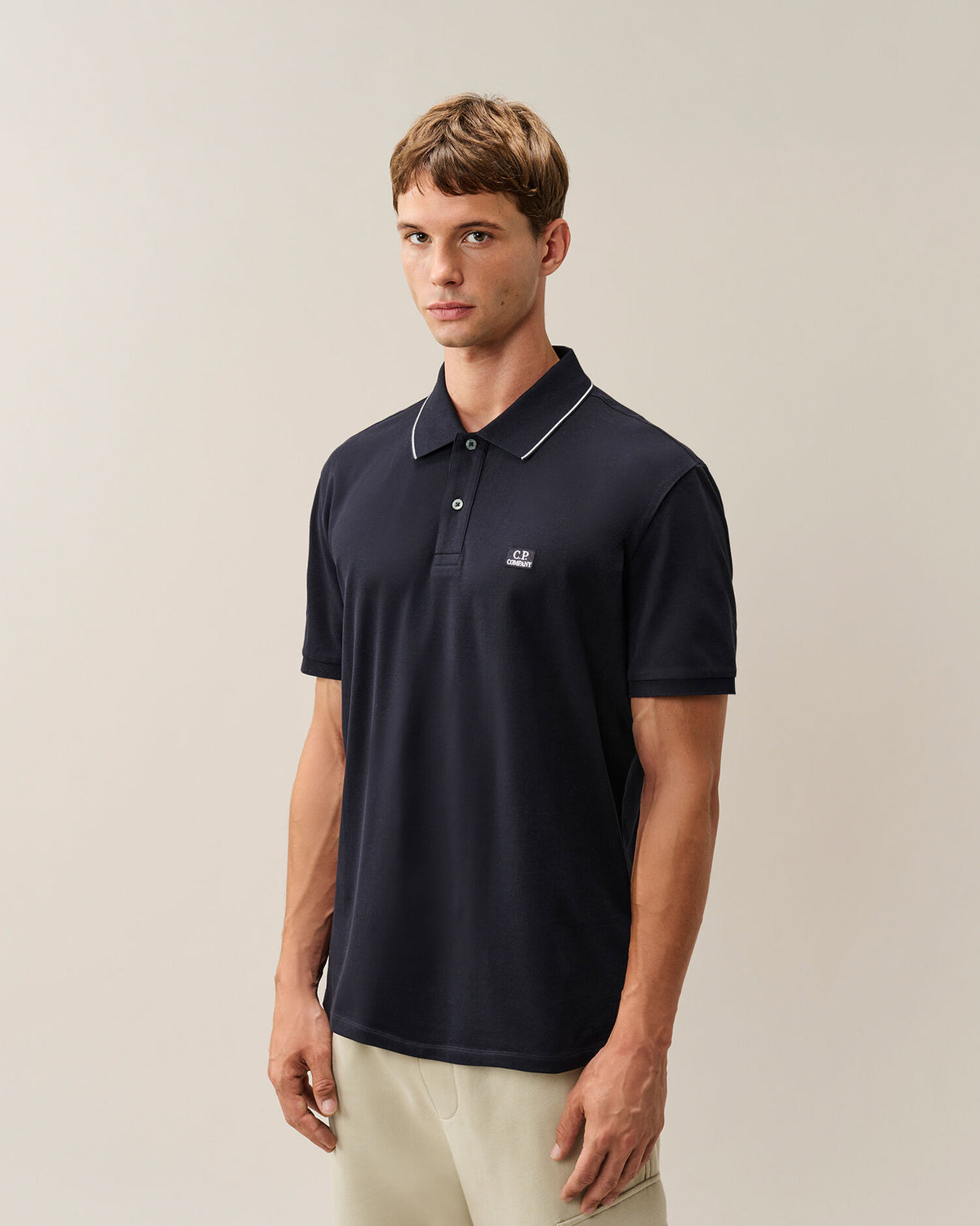 C.P. Company Stretch Piquet Striped Collar Polo Shirt in Navy