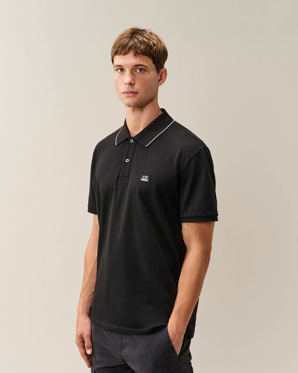 C.P. Company Stretch Piquet Striped Collar Polo Shirt in Black