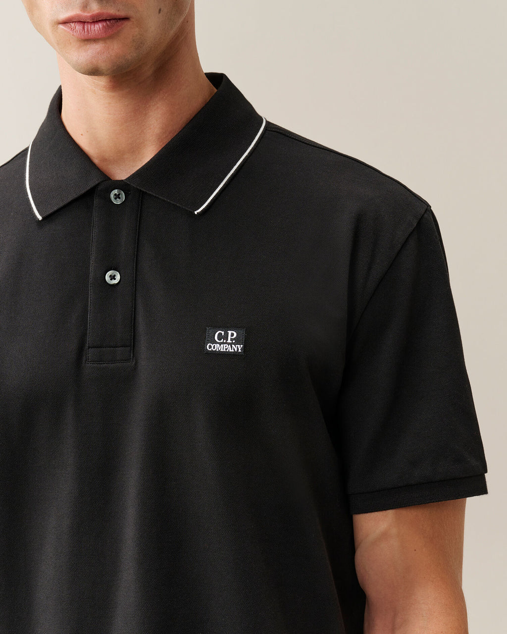 C.P. Company Stretch Piquet Striped Collar Polo Shirt in Black