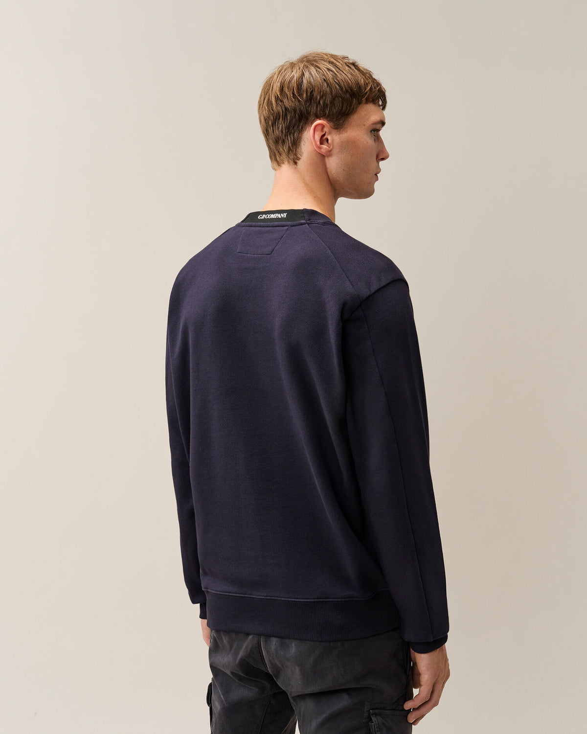 C.P. Company Diagonal Raised Fleece Crewneck Lens Sweatshirt in Navy