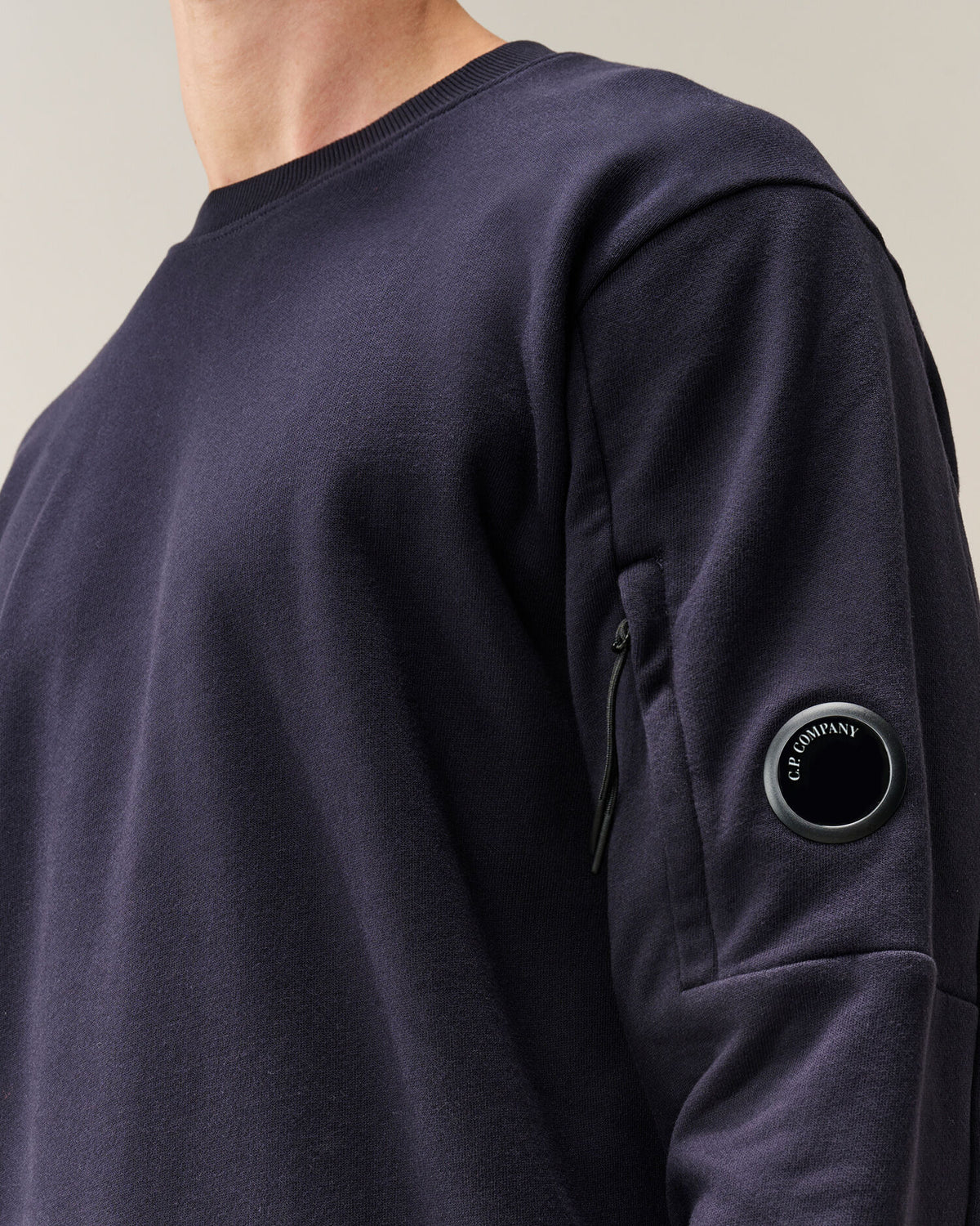 C.P. Company Diagonal Raised Fleece Crewneck Lens Sweatshirt in Navy