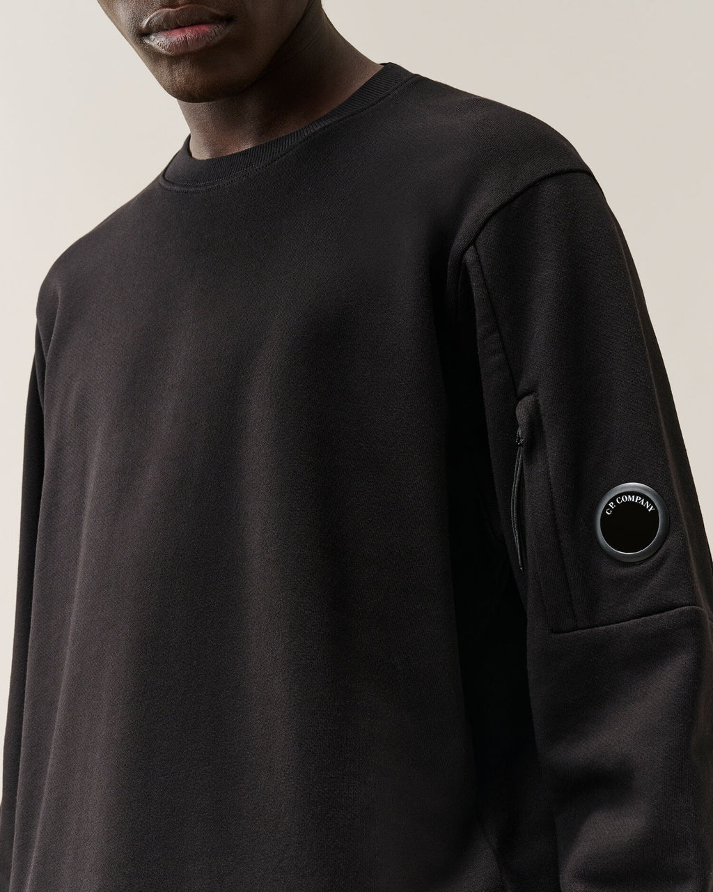 C.P. Company Diagonal Raised Fleece Crewneck Lens Sweatshirt in Black