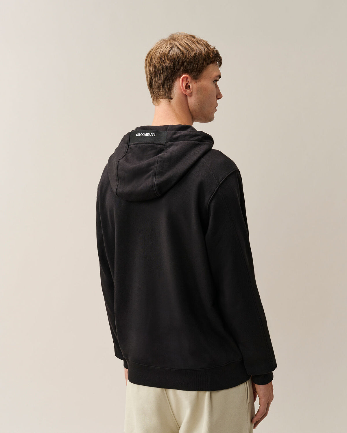 C.P. Company Diagonal Raised Fleece Lens Hoodie in Black