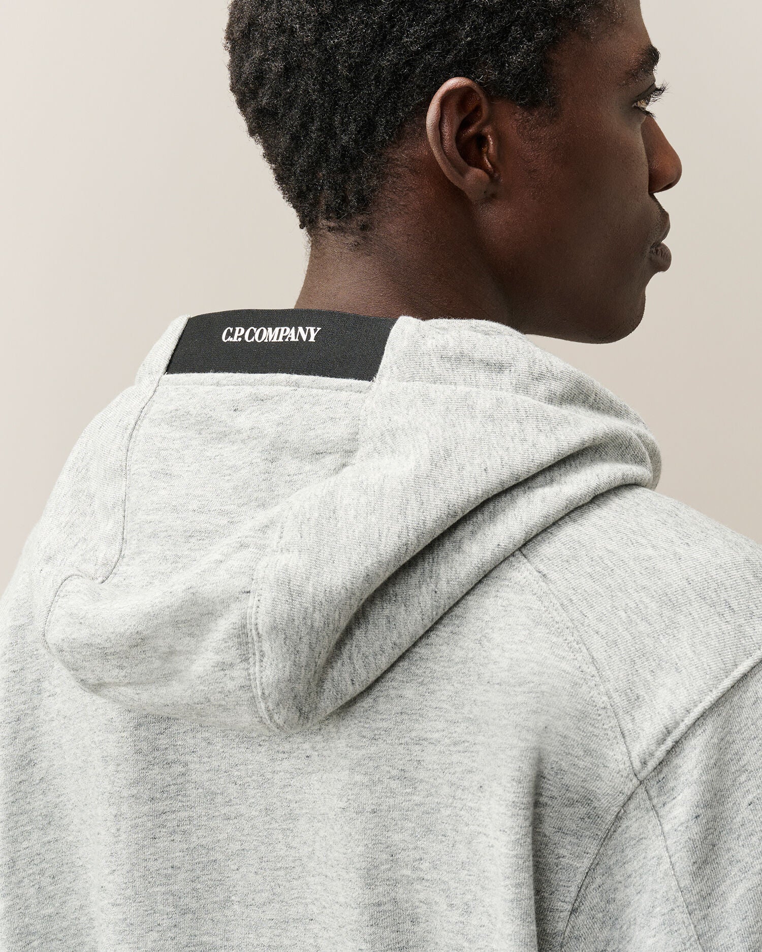 C.P. Company Diagonal Raised Fleece Lens Hoodie in Grey Melange