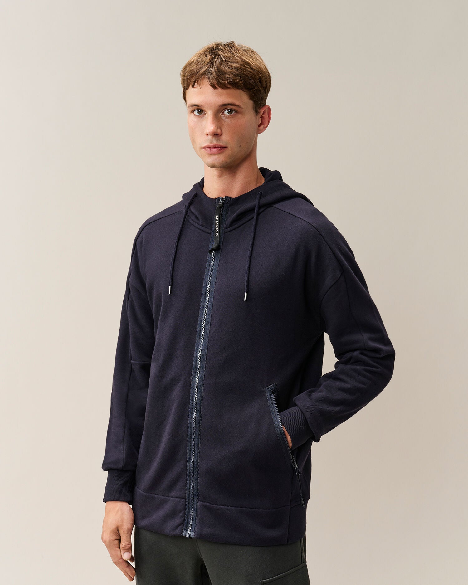 C.P. Company Diagonal Raised Fleece Goggle Hoodie in Navy
