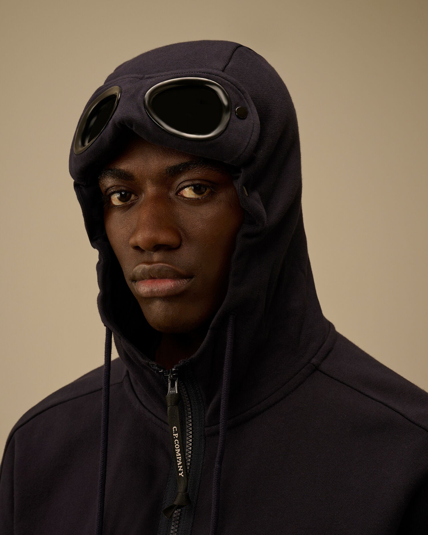 C.P. Company Diagonal Raised Fleece Goggle Hoodie in Navy