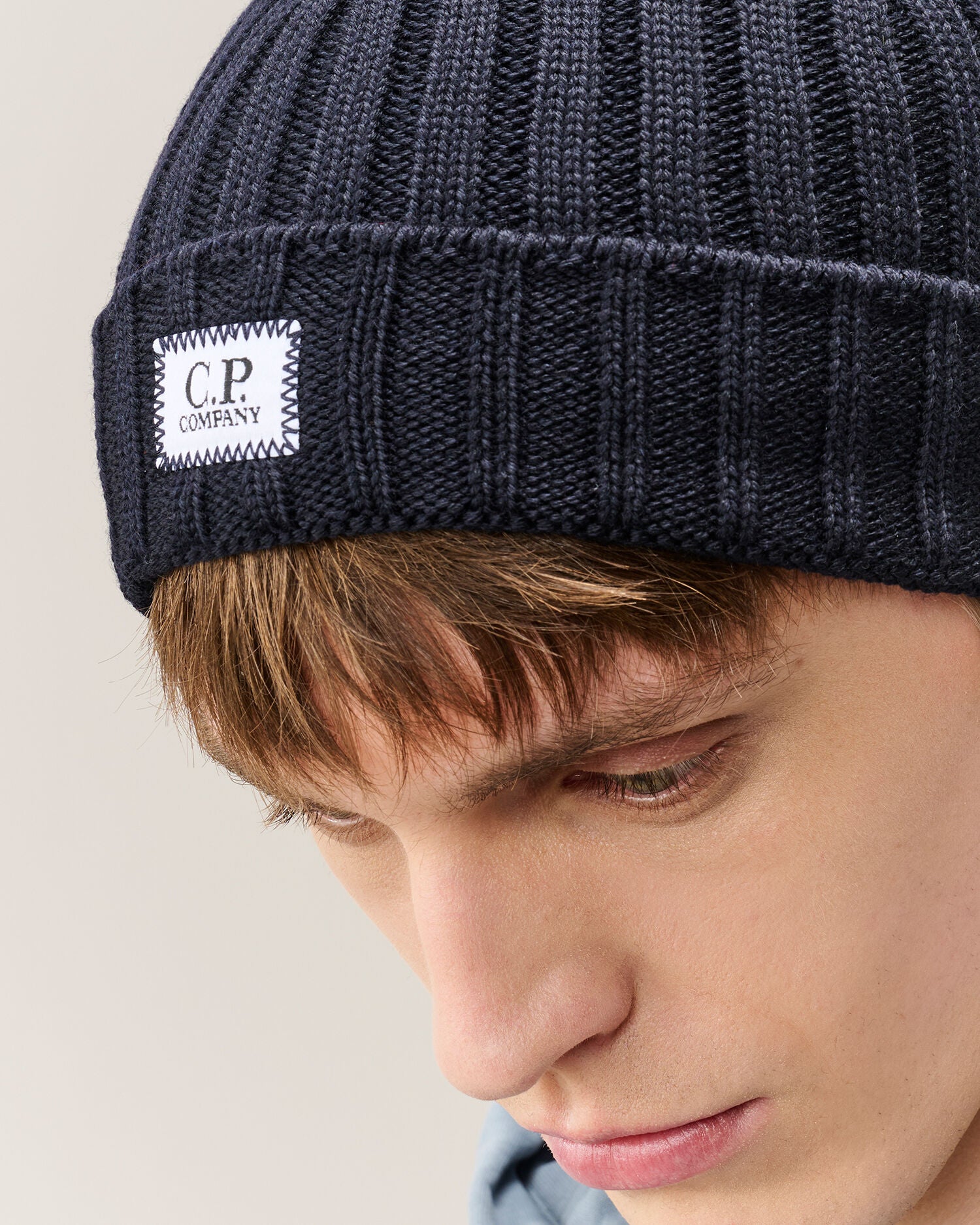 C.P. Company Extra Fine Merino Wool Logo Beanie in Navy