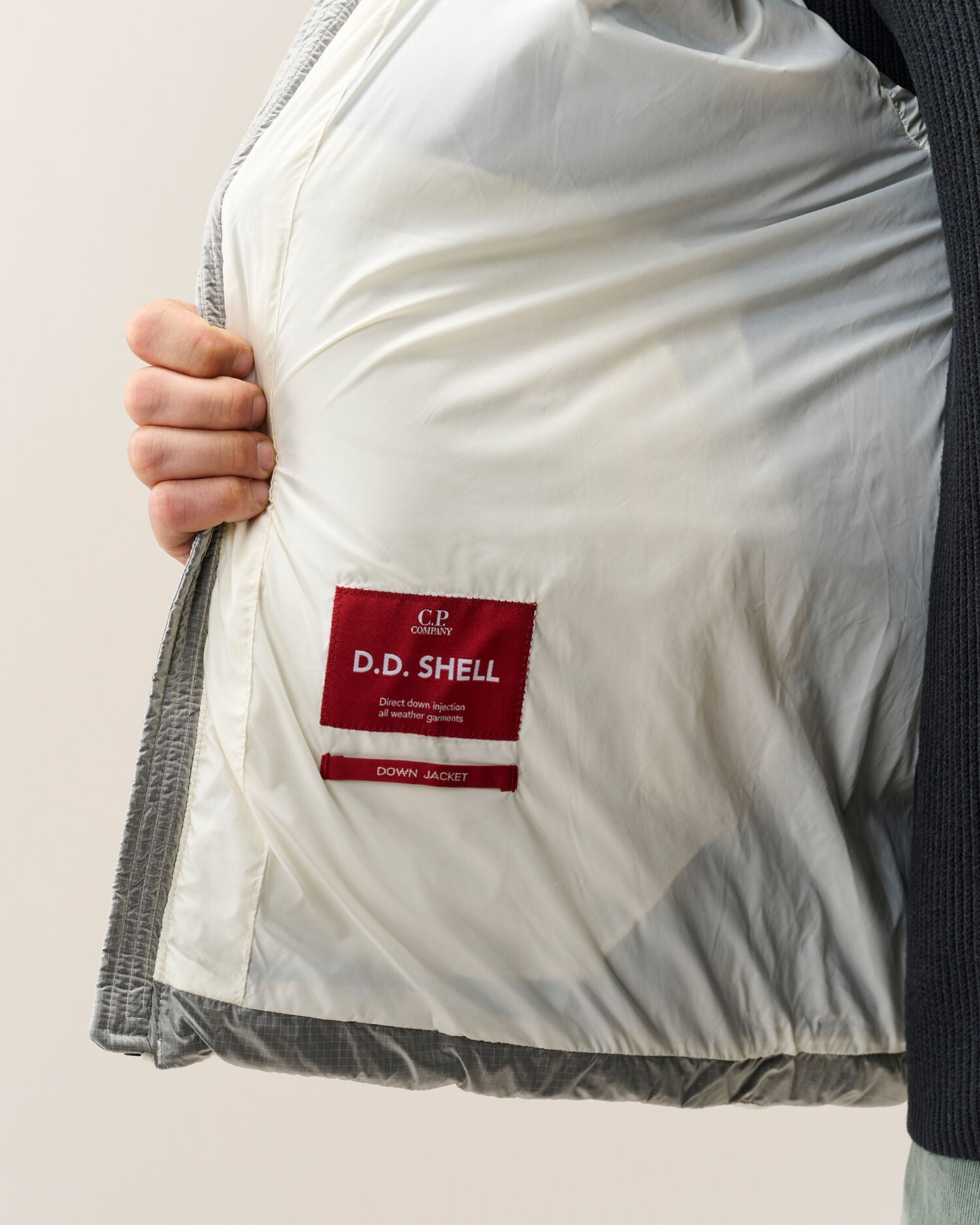 C.P. Company D.D. Shell Lens Puffer Jacket in Gauze White